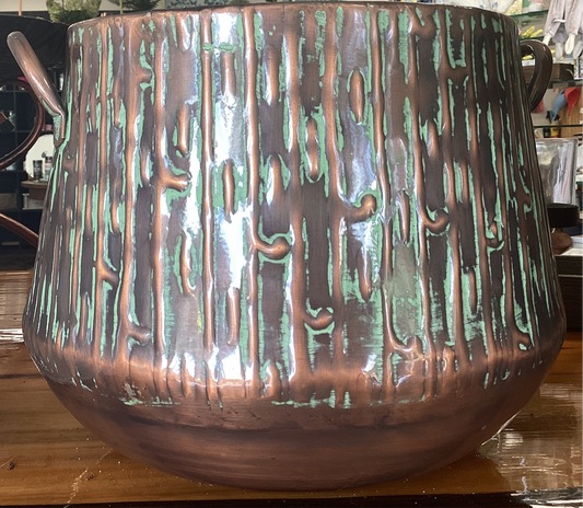 Bronze and green metal planter