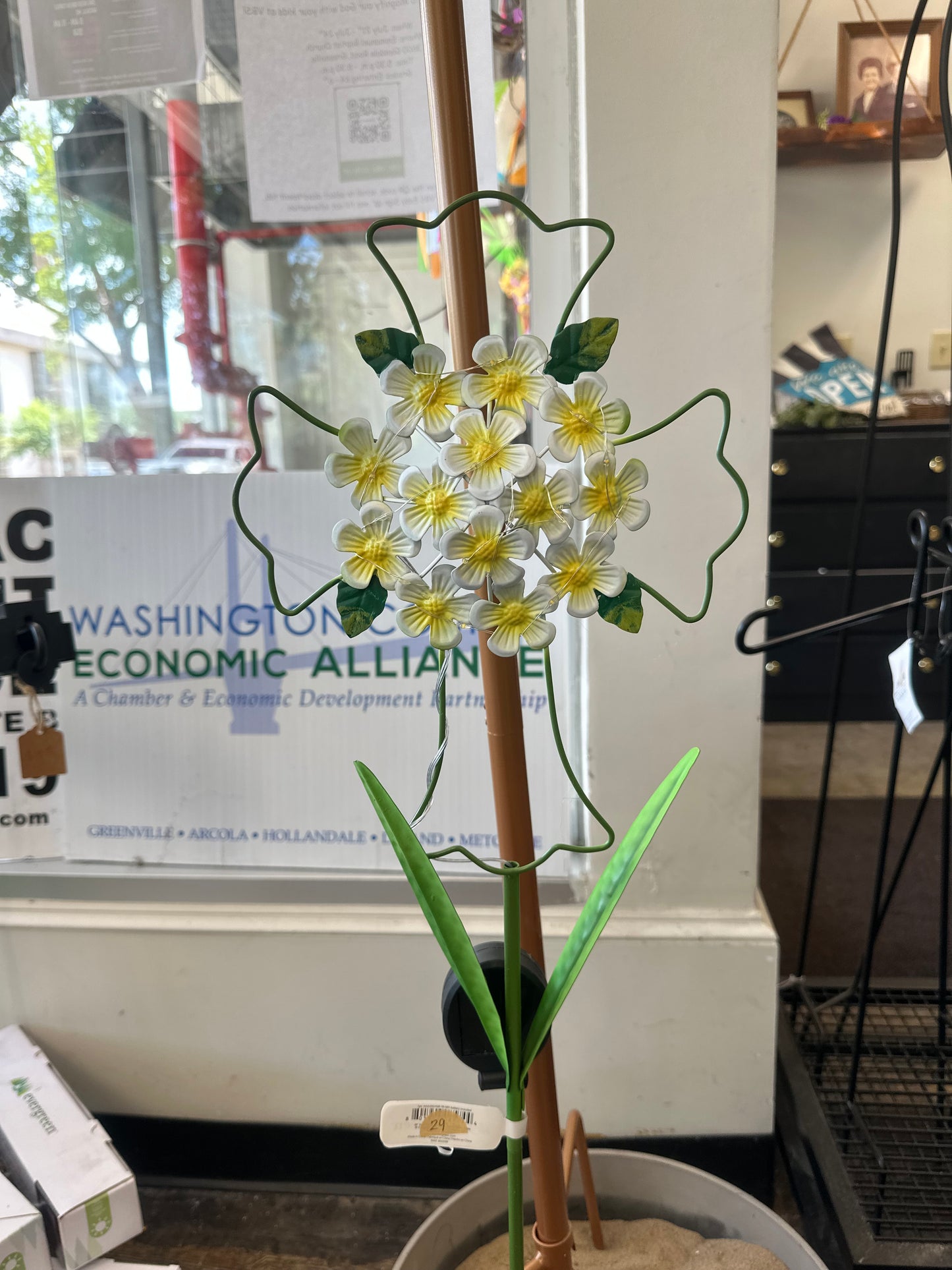 Evergreen flower cross outside stand