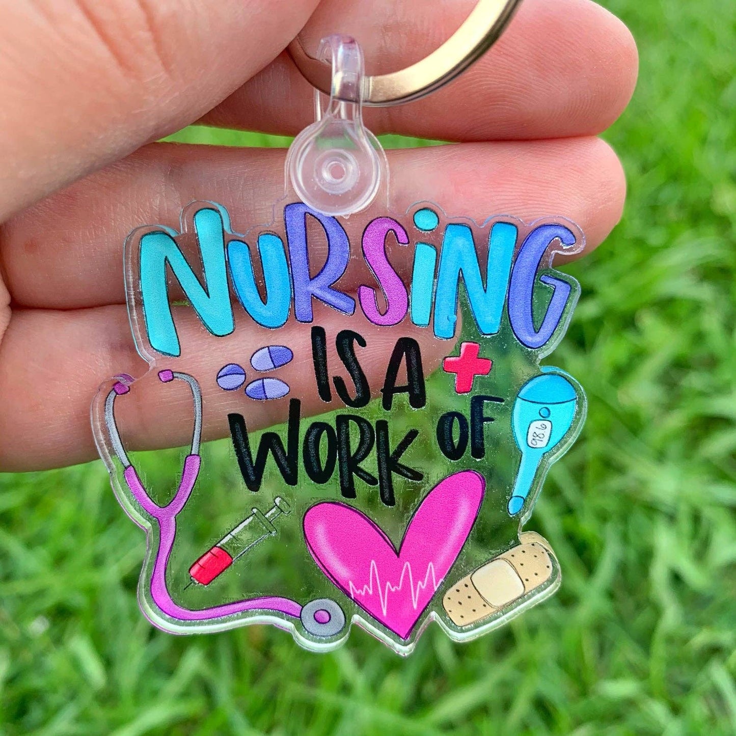 Nursing Is A Work Of Heart Acrylic Keychain