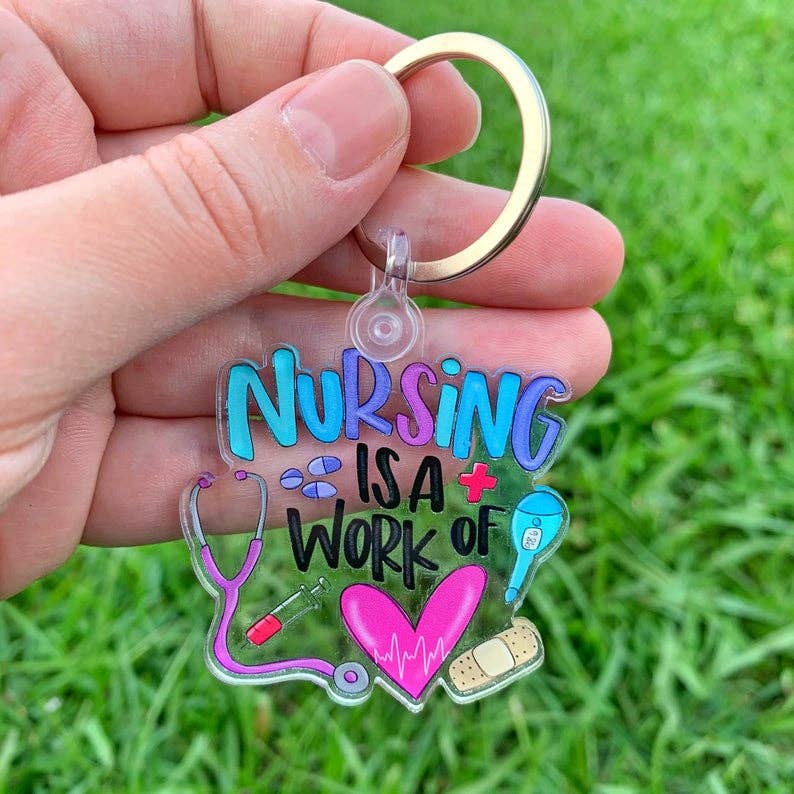 Nursing Is A Work Of Heart Acrylic Keychain