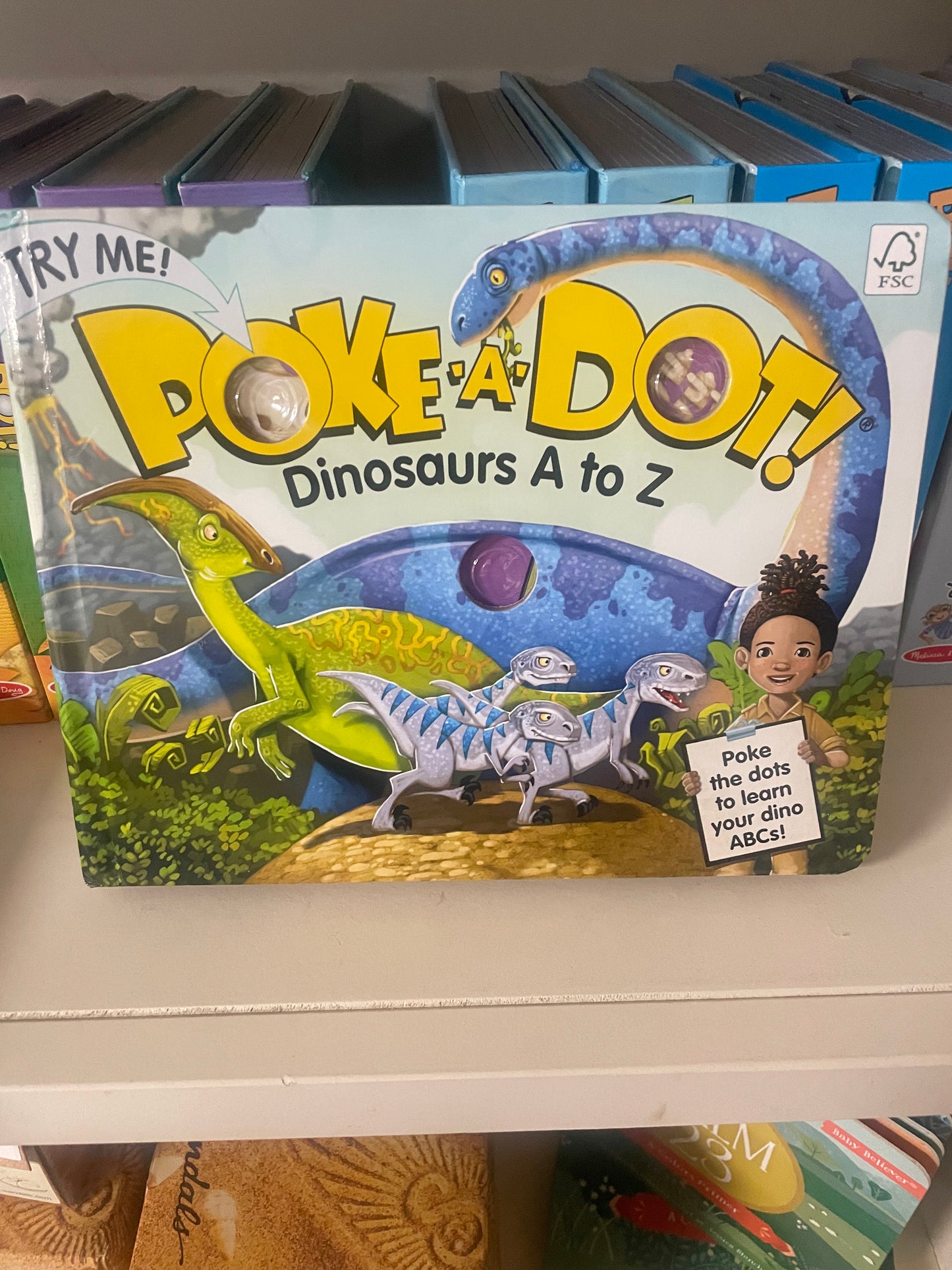 Dinosaurs A to Z Poke A Dot Book